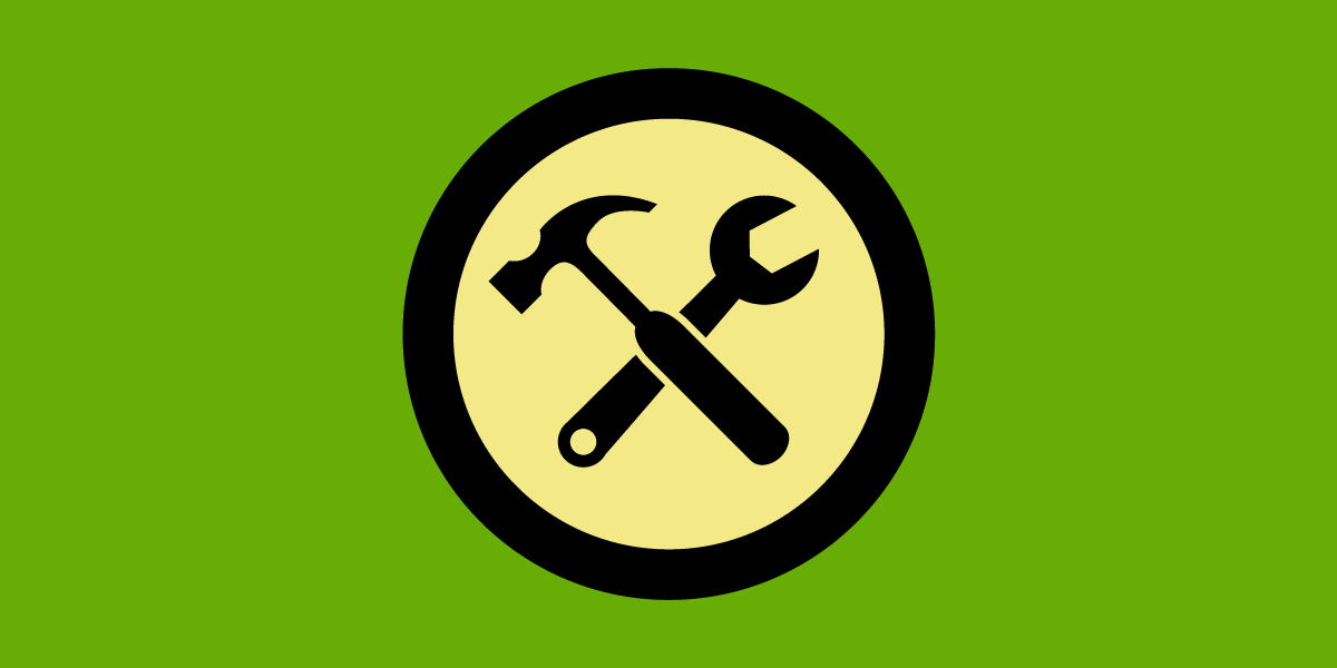 circle logo with crossed hammer and wrench