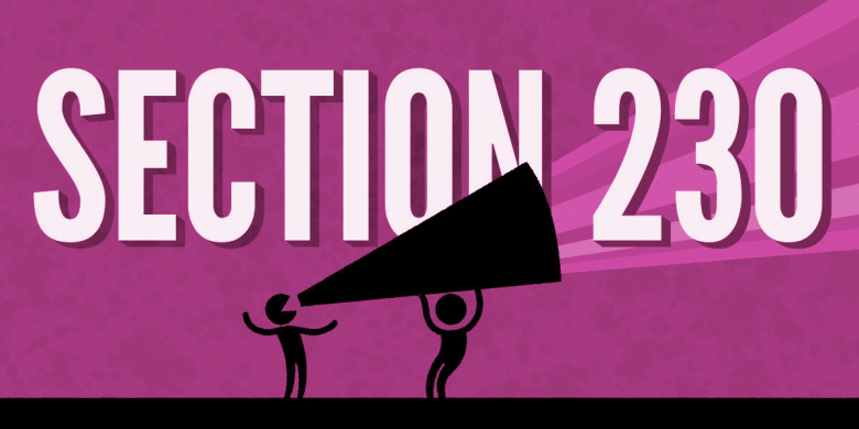 One person holds a megaphone for another, with rainbow stripes