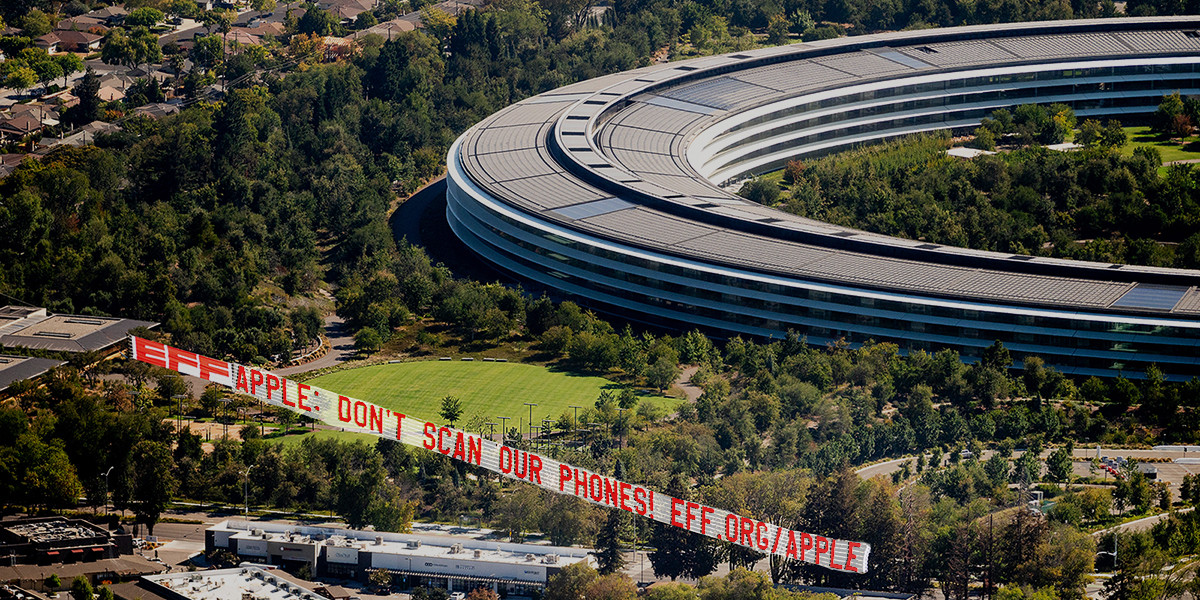 A plane flies a banner over Apple’s Cupertino,