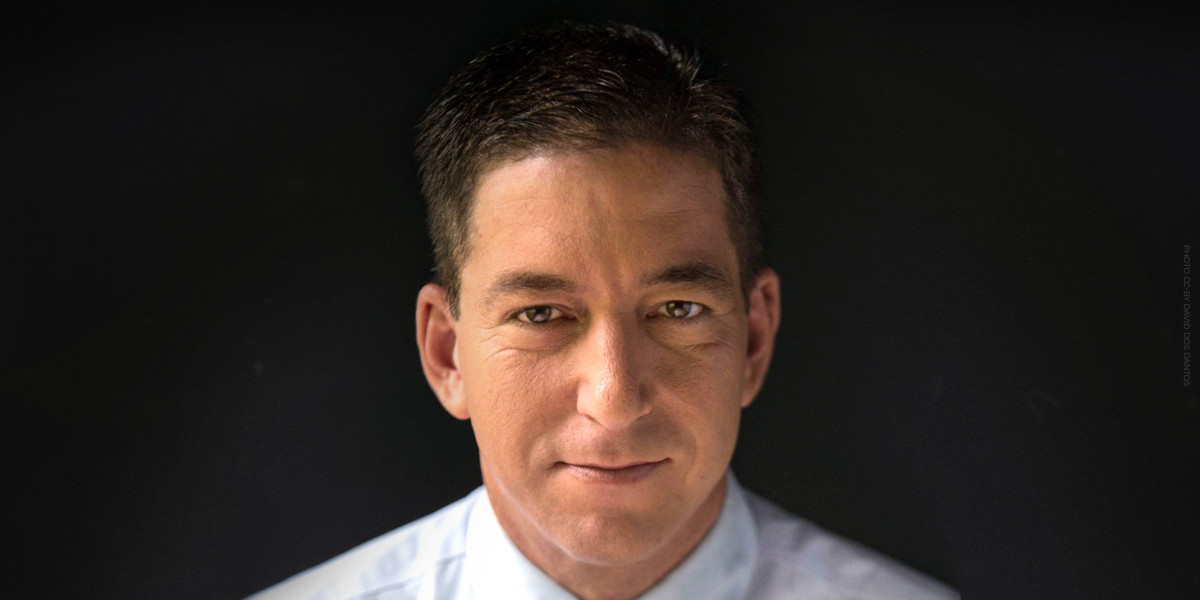 Glenn Greenwald Portrait of Glenn Greenwald against a dark background. Photo by David dos Dantos CC-BY