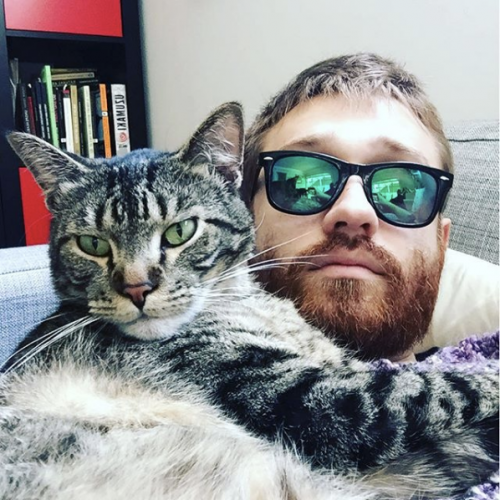 Josh and his cat Hero. Guy with a handsome cat.
