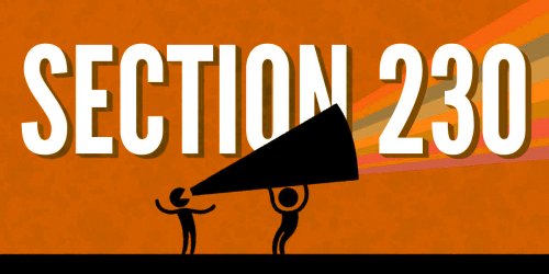 One person holds a megaphone for another, with rainbow stripes